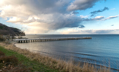 Obraz premium Rocks and sandy beach on the coast of the Baltic Sea in Gdynia 