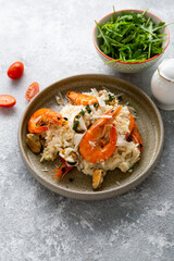 Close up of rice with seafood in bowl