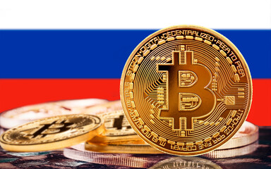 bitcoin coin and russian flag in the background, several bitcoin coins with russian flag in the background, bitcoin and russia concept
