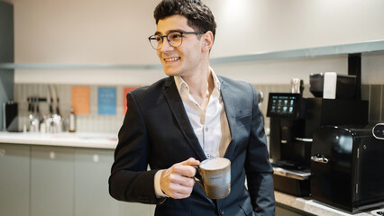 Coffee break career manager with glasses work office in a dark business suit