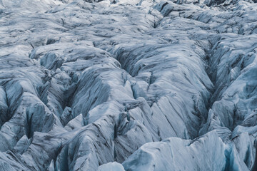 Massive crevassed glacier background, long shot