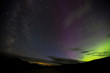 Northern lights and milky way in Dovrefjell National Park, Norway