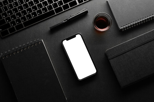 Modern black workspace compositions with smartphone mockup