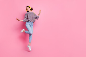 Photo of dreamy sweet woman wear pullover headphones dancing empty space isolated pink color background