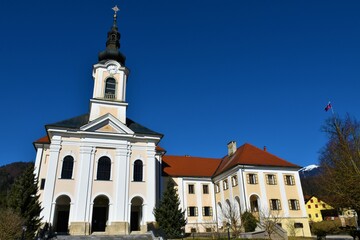 Fototapeta na wymiar Church of the Assumption and Velesovo monastery in Adergas near Cerklje na Gorenjskem in Slovenia