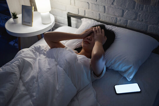 Women are stressed with social media before going to bed.