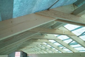 construction of a wooden roof. timber roof of a new house. framework