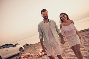 Photo of carefree funny young husband wife dressed casual outfits riding cabriolet walking enjoying...