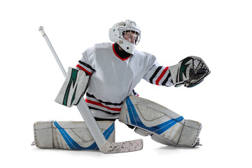 Portrait of teen boy, goalkeeper, hockey player taining isolated over white studio background