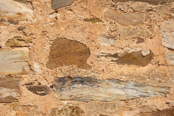 limestone wall of an old dwelling