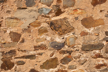 limestone wall of an old dwelling