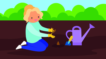 woman planting seeds in the garden and watering