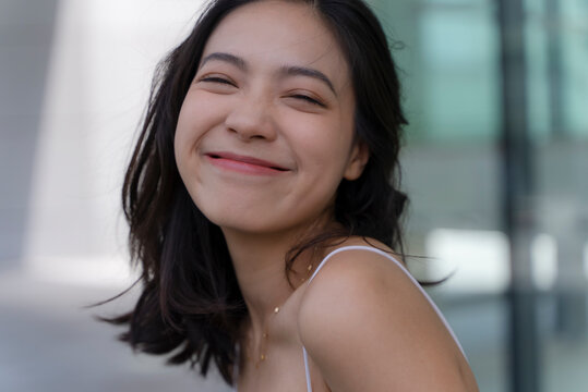 Charming Young asian woman smile at Camera