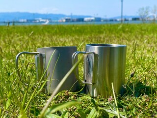 watering can in grass
mag
pair 
grass 
green 
park 
camp 
day camping 
ディキャンプ
キャンプ
マグ
ペア
マグカップ
草
芝生