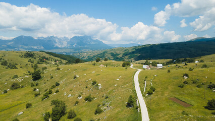 Beautiful green mountain road in Pisce, Montenegro. Aerial view