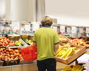 Man buying fruits at the market