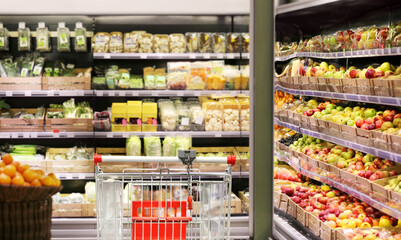 Choosing food from shelf in supermarket,vegetables in grocery section,Grocery stores