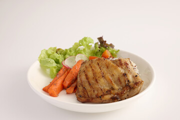 Grilled chicken with rice isolated in white background