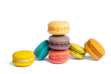 Colorful macaroon cakes. Small french muffins. Colorful macarons on a white background