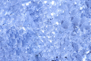 Blurred Christmas background of blue Christmas garlands.