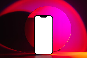 Mockup Smartphone with geometric shape on abstract background in neon gradient. Mobile phone ith blank white screen for presentation or application design show. Vivid   pink and orange colors.