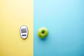  diabetic measurement tools, apple on table 
