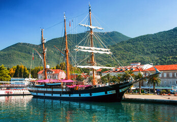 Old sailboat in harbour at town Tivat in Montenegro