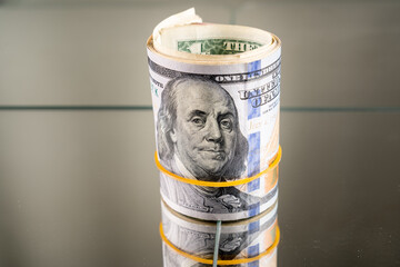 Assorted american dollars (USA banknotes) in the form of rolls