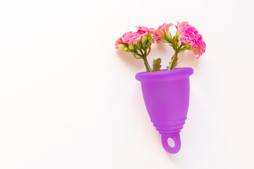 Naklejka na ściany i meble Very Peri menstrual cup with succulent flower bouquet