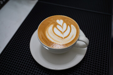 hot latte art coffee on table, relax time