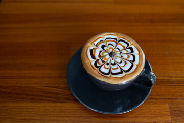 hot latte art coffee on table, relax time