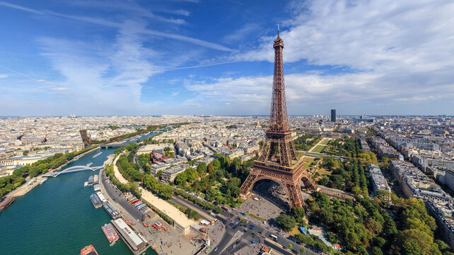 Panoramic aerial view of the Eiffel Tower and Champ de Mars in Paris, France.