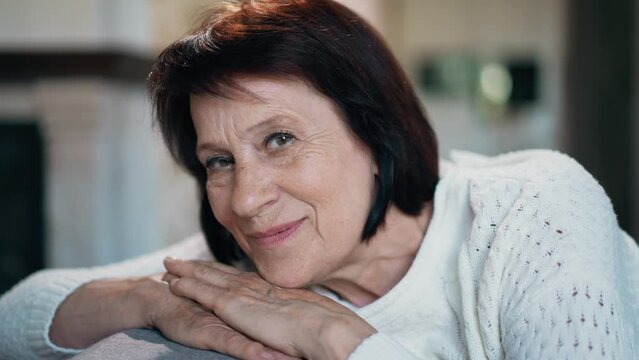 Portrait of mature woman at home
