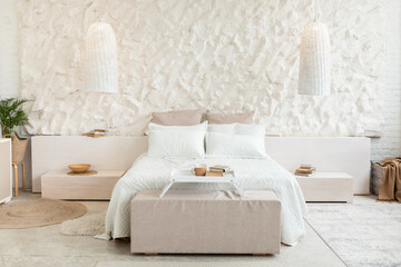 Fototapeta na wymiar Cozy Bed In Modern Bedroom With White Walls And Furniture