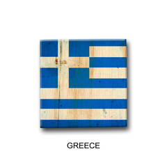 Greece flag on a wooden block. Isolated on white background. Signs and symbols.