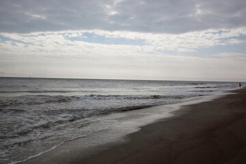 Fototapeta na wymiar At the beach on an overcast day