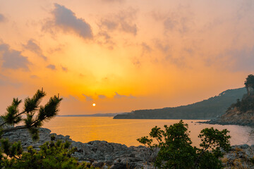 Fototapeta na wymiar View of sunset sea in Seogwipo-si, Jeju island, Korea