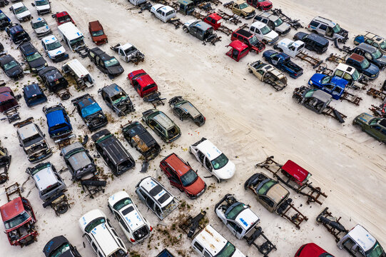 Aerial view of many vehicles in a car park junkyard, Palmdale, Florida, United States.