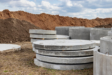 Reinforced concrete rings for the installation of underground wells at the construction site. Reinforced concrete products for the device of underground communications. Sewerage and plumbing.