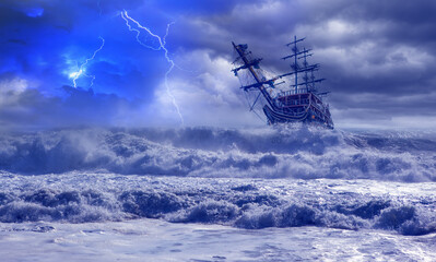 Fototapeta na wymiar Sailing old ship in a storm sea in the background stormy clouds