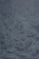 Faded paint strokes on blue paint