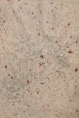 Red speckled white background