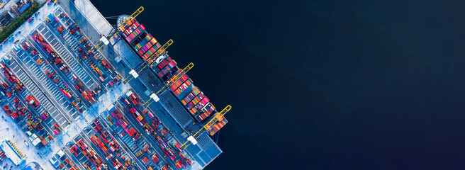 Aerial top view of the containers cargo ship. business logistic transportation sea freight, cargo ship, cargo container in deep sea port at industrial estate for import export around in the world - obrazy, fototapety, plakaty