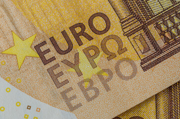 A man counts money - euro banknotes with a face value of 50 euros	
