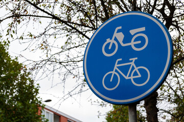 Closeup of bike path sign in the street