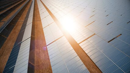 Ecology solar power station panels at sunset.
Flight over of Solar Panels Farm.  4K seamless loopable animation.
