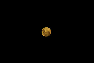 Beautiful view of the full moon with golden color