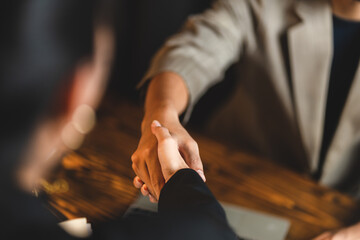business hand contract meeting with success agreement concept, professional businessman handshake in modern office with cooperation person team, teamwork partnership deal and greeting