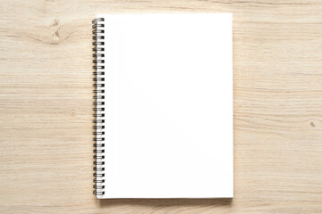 Blank spiral bound notepad mockup template with Kraft Paper cover, isolated on wood background. - Powered by Adobe