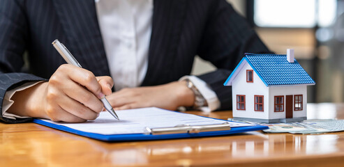 Real estate agent and customer make contract to buy and sell house and land. Approval of a contract...
